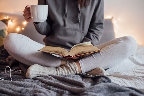 girl reading a book on overcoming social anxiety